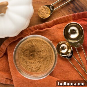 A jar of homemade pumpkin pie spice mix, ready for fall baking.
