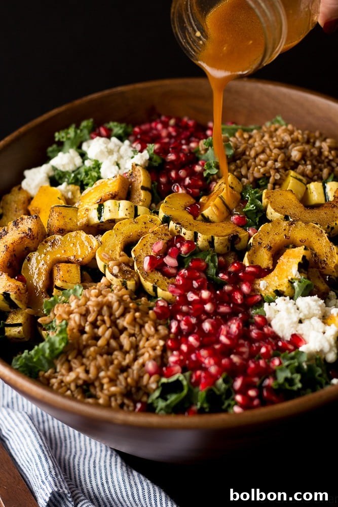 A bowl of fresh pomegranate arils, ready to be added to the Autumn Harvest Salad.
