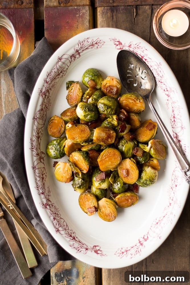 A serving of maple bacon roasted Brussels sprouts in a rustic bowl, highlighting their appealing texture and glaze.