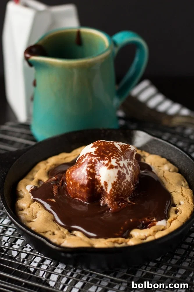 A close-up shot of the raw chocolate chip blondie batter, rich with chocolate chips, in a mixing bowl.