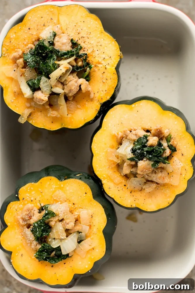 Hearty Sausage and Kale Stuffed Acorn Squash 4 Beautifully roasted acorn squash filled with seasoned sausage and wilted kale.
