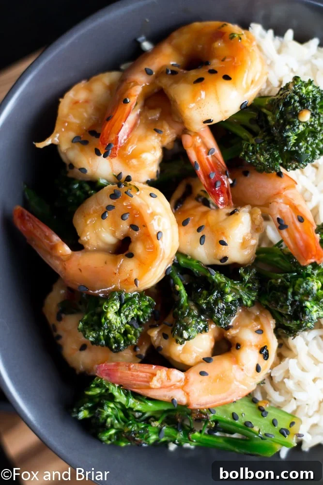 Sticky Honey Sesame Shrimp with Crisp Broccoli 3 This Honey Sesame Shrimp and Broccoli is a quick and easy dinner. Shrimp and broccoli are quickly sauteed in a sweet and savory sauce that everyone will love! This is great served over rice or noodles, or you can use cauliflower rice or zoodles for a lower carb dinner.