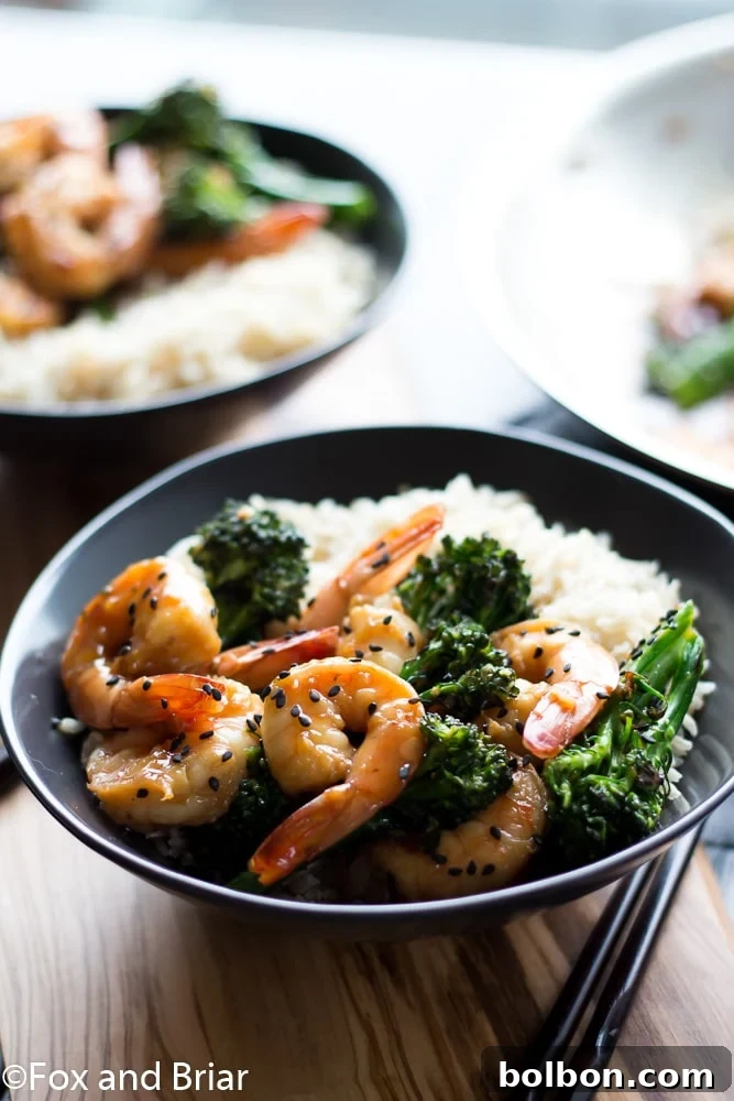 Sticky Honey Sesame Shrimp with Crisp Broccoli 4 This Honey Sesame Shrimp and Broccoli is a quick and easy dinner. Shrimp and broccoli are quickly sauteed in a sweet and savory sauce that everyone will love! This is great served over rice or noodles, or you can use cauliflower rice or zoodles for a lower carb dinner.