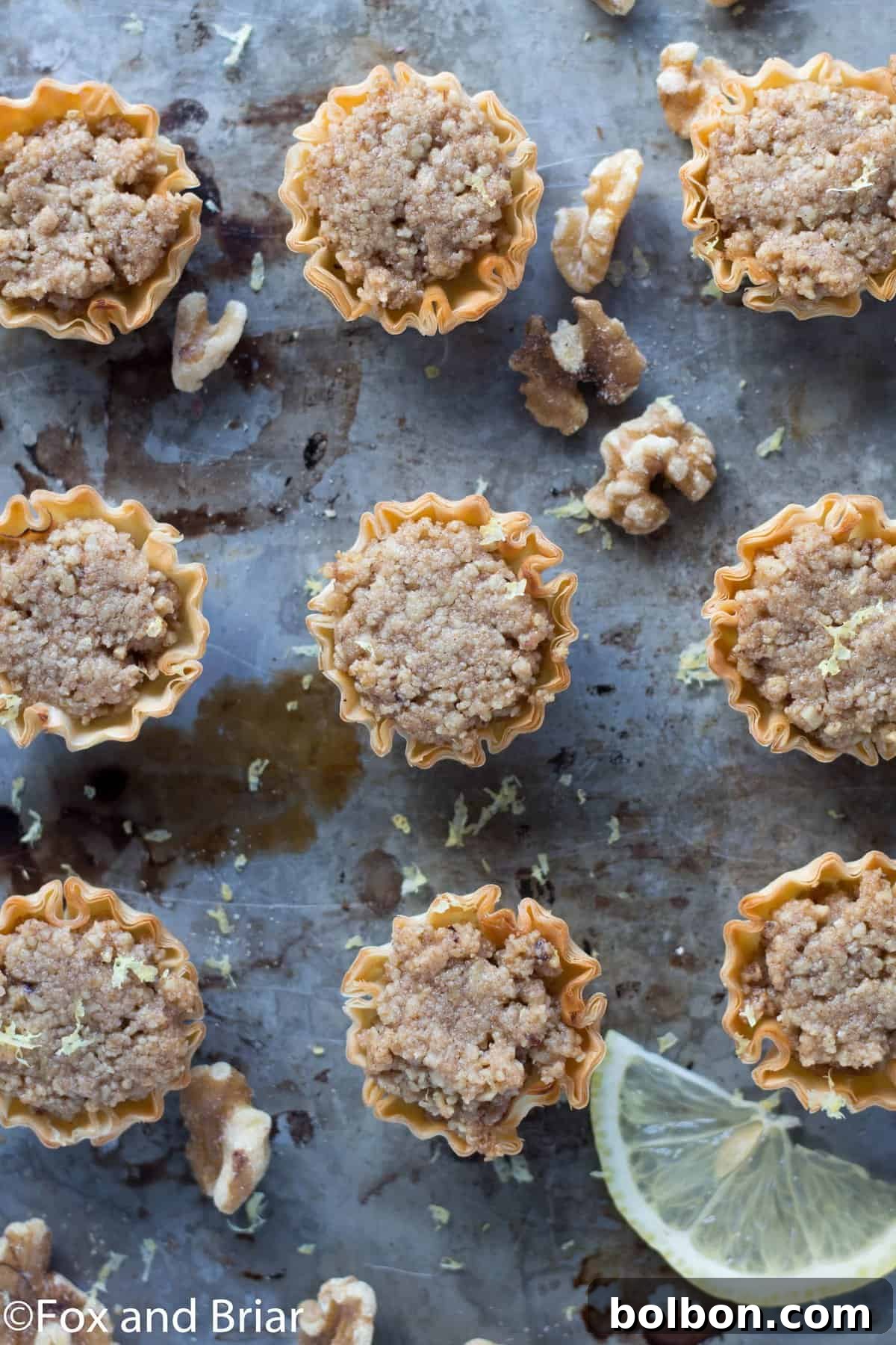 Effortless Mini Baklava Delights 4 Freshly baked Mini Baklava Cups drizzled with sweet lemon syrup, ready to serve