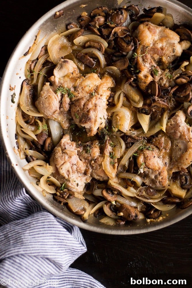 Skillet Chicken with Wine-Kissed Mushrooms 8 A stunning overhead shot of Skillet Chicken and White Wine Mushrooms, ready to be served.