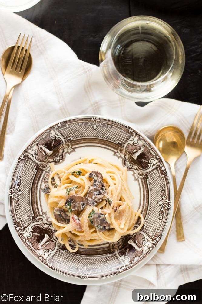 Creamy Bacon Mushroom Pasta served in a bowl, ready to eat