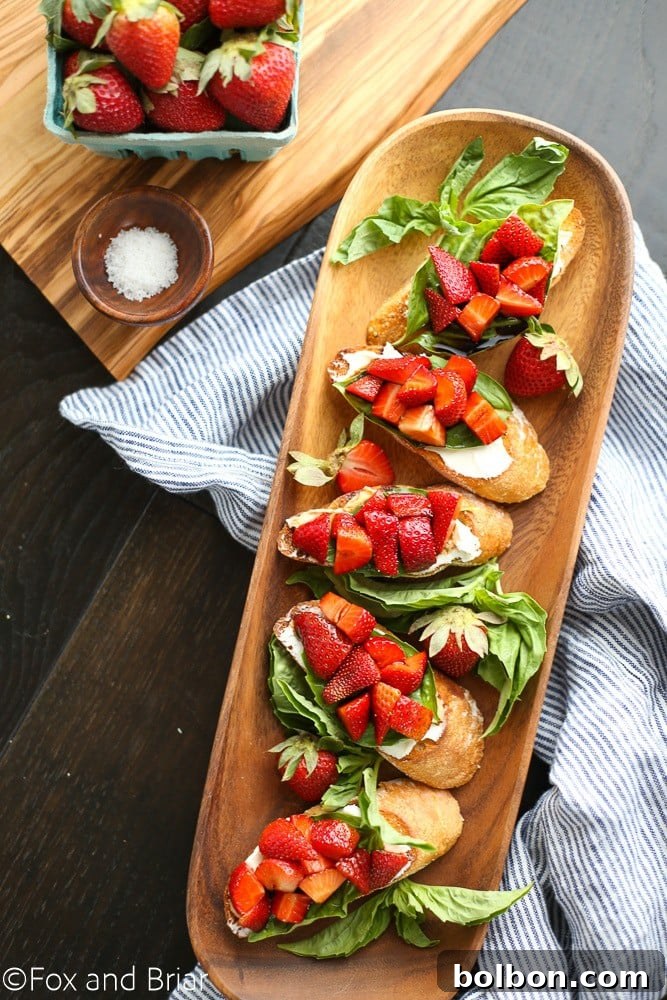 Close-up of a Strawberry Chambord Whipped Cheese Toast, showcasing the whipped cheese and berries