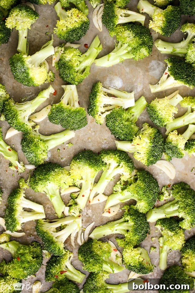 A serving of freshly roasted lemon parmesan broccoli in a bowl, ready to be enjoyed