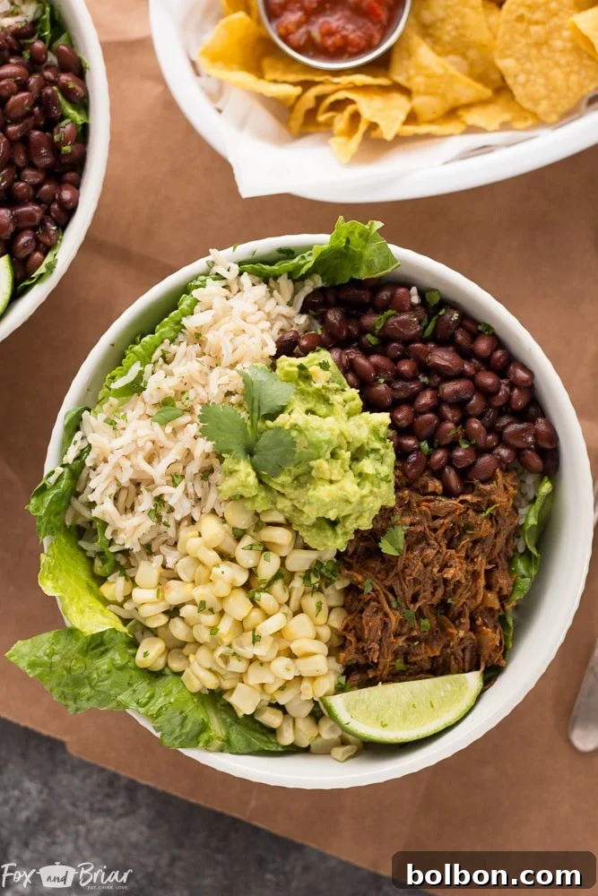 A vibrant and delicious Slow Cooker Beef Burrito Bowl, perfectly portioned for a healthy meal. Ideal for make-ahead meal prep.