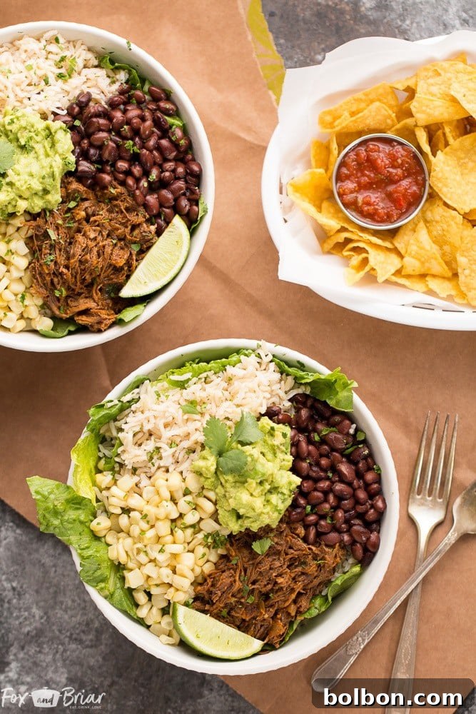 A close-up view of a vibrant Slow Cooker Beef Burrito Bowl, highlighting the textures and colors of the ingredients.
