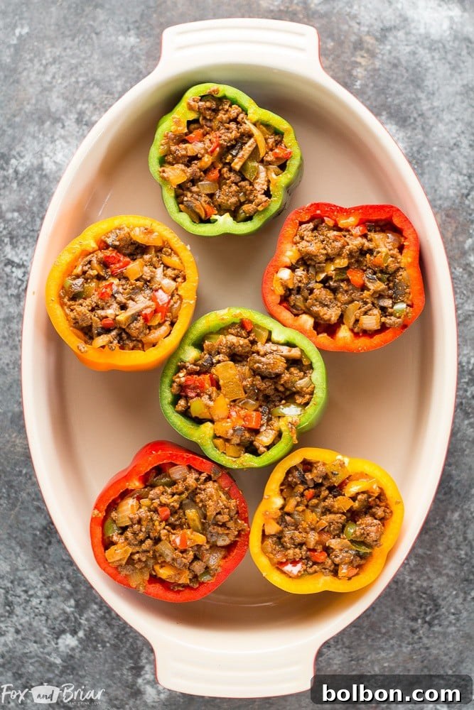 Cheesy Pizza Stuffed Peppers 4 Close-up of the delicious Pizza Stuffed Bell Peppers, showcasing the melted mozzarella cheese bubbling to perfection.