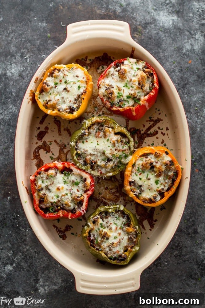 Golden brown and bubbly mozzarella cheese topping the savory Pizza Stuffed Bell Peppers, fresh out of the oven.