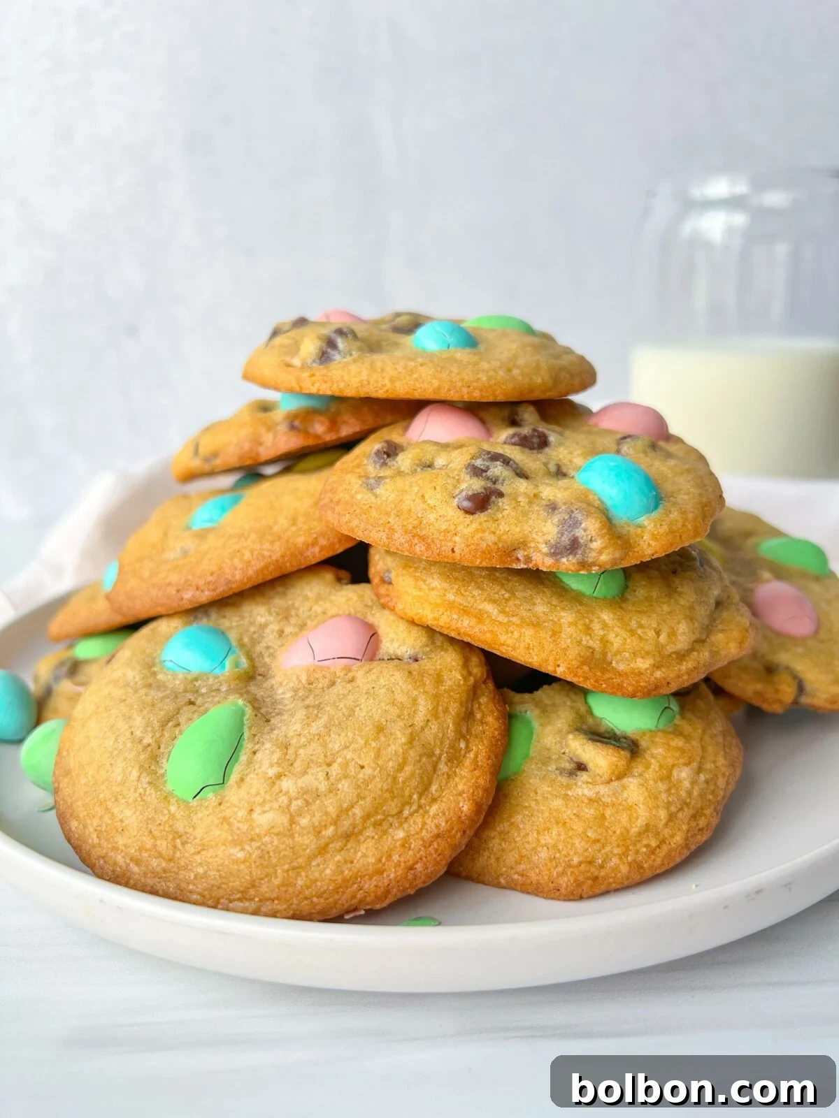 Cadbury's Decadent Chocolate Chip Cookies 2 Cadbury Chocolate Chip Cookies - Perfectly golden, chewy cookies adorned with colorful Cadbury Mini Eggs, ideal for Easter celebrations and family baking.