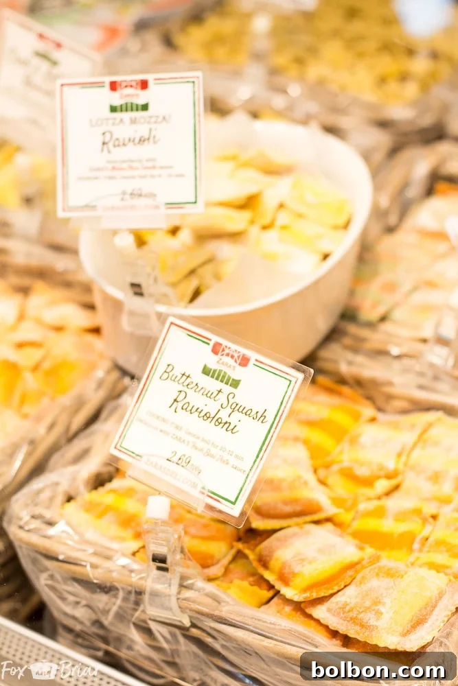 Fresh pasta display at Granville Island Market, a foodie's delight in Vancouver, BC.