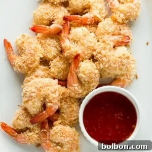 The finished dish: perfectly baked coconut shrimp, golden and inviting.