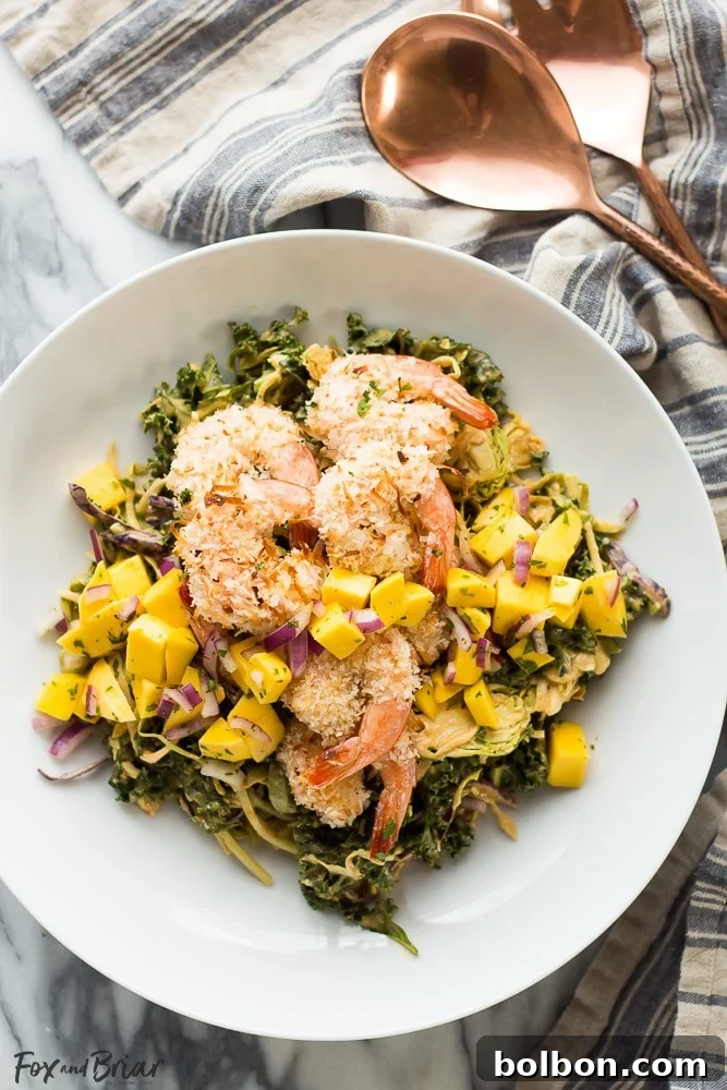 Crispy Coconut Shrimp Salad with Zesty Mango Salsa and Creamy Peanut Dressing 2 Tropical Coconut Shrimp Salad with crispy shrimp, fresh mango salsa, and creamy peanut dressing