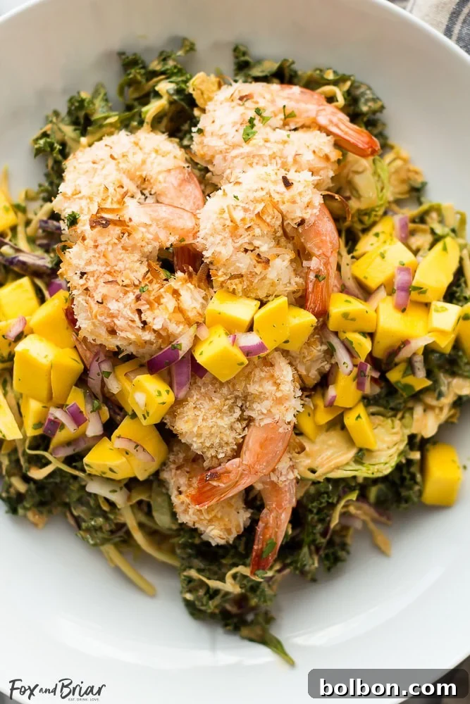 Crispy Coconut Shrimp Salad with Zesty Mango Salsa and Creamy Peanut Dressing 5 Bowl of Coconut Shrimp Salad with mango salsa and peanut dressing drizzle