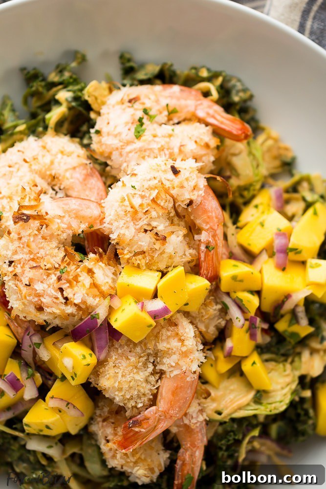 Crispy Coconut Shrimp Salad with Zesty Mango Salsa and Creamy Peanut Dressing 7 Beautifully plated tropical Coconut Shrimp Salad ready to be enjoyed