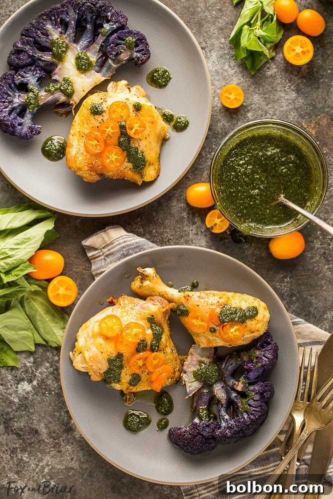 Golden Roasted Chicken and Cauliflower with Olive Oil 2 Sheet pan dinner with roasted chicken, purple cauliflower, and kumquats drizzled with basil oil