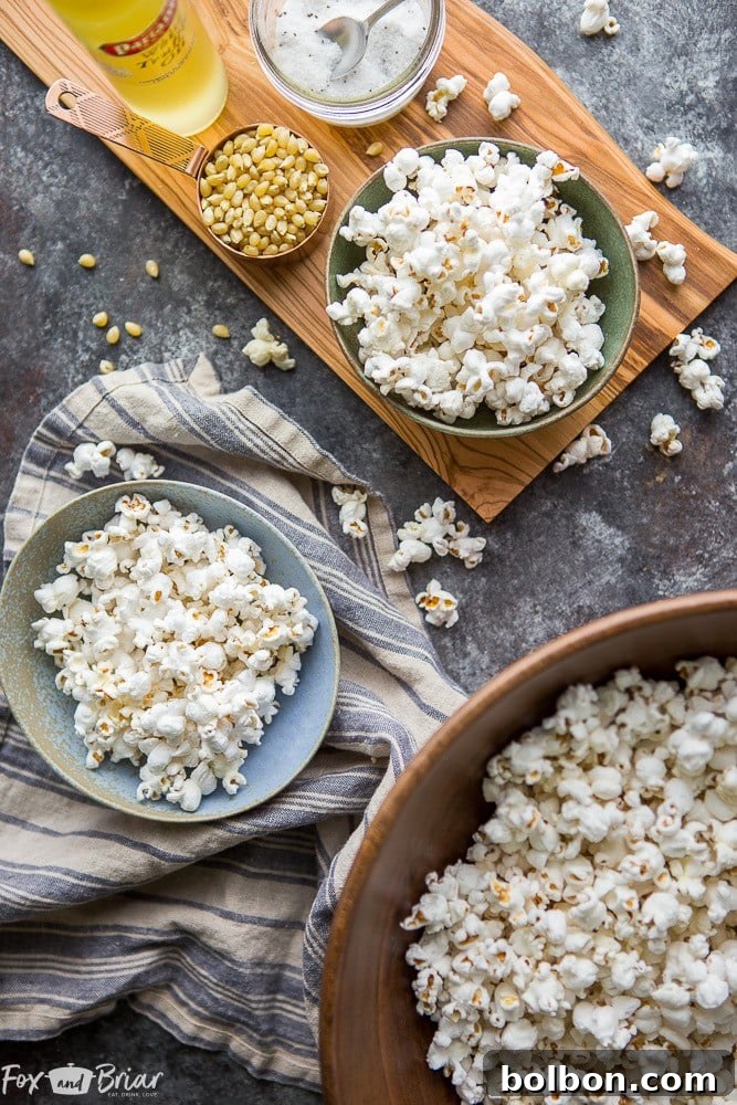 Close-up of a large bowl filled with perfectly seasoned truffle popcorn, highlighting its fluffy kernels and rich, aromatic coating. | ultimate truffle popcorn recipe | quick snack ideas | gourmet cooking at home