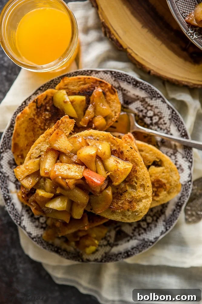 Delicious Apple Pie French Toast with a generous serving of apple compote, a perfect fall breakfast.