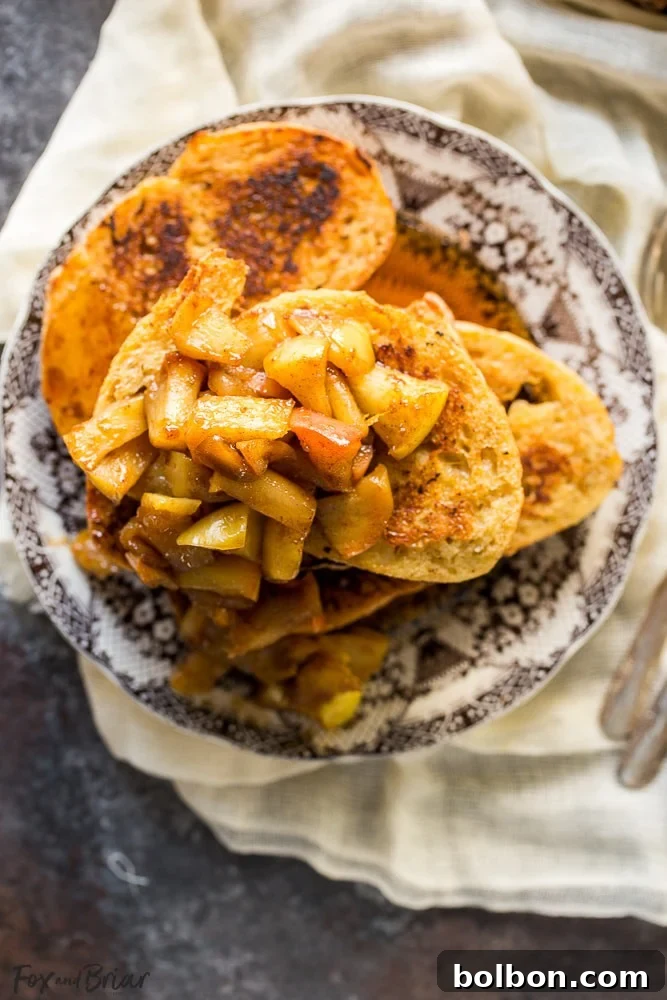 Perfectly cooked Apple Pie French Toast slices stacked and ready to be served.