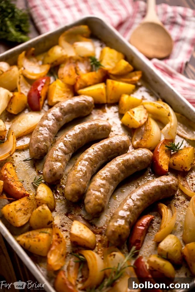Prepared ingredients for a one-pan sausage and potato dinner, highlighting fresh ingredients.