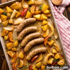 Finished Sausage and Potatoes Sheet Pan Dinner, golden brown and ready to serve.