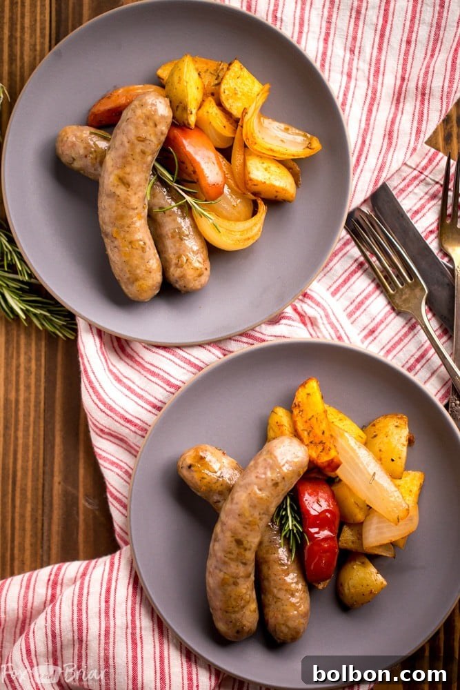 Close-up of a serving of sausage and potatoes from the sheet pan dinner, ready to eat.