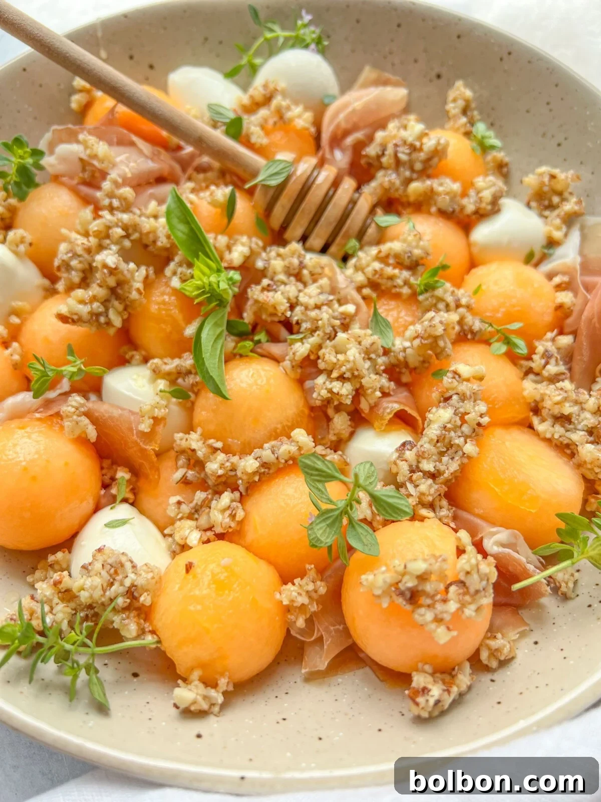 Ham and Melon Medley 3 Close-up of Prosciutto and Melon Antipasto with Honey Walnut Crumble