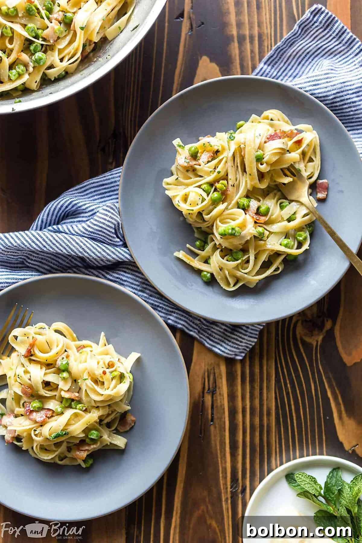 The final spread of Creamy Pasta with Pancetta and Peas, perfectly plated and ready to serve, symbolizing a convenient and delightful meal thanks to QFC delivery.