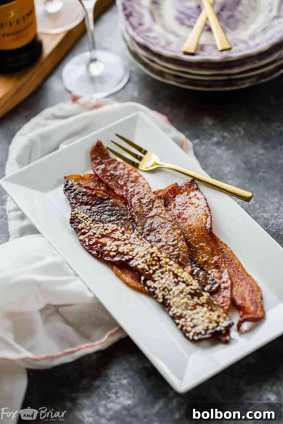 A final close-up of the delicious variety of oven-baked flavored bacon, ready to be served.