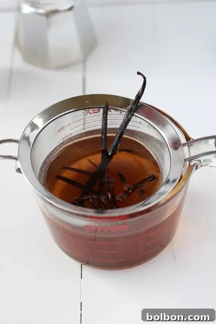 Triple Vanilla Dream 5 Vanilla beans soaking in a pot of simmering syrup