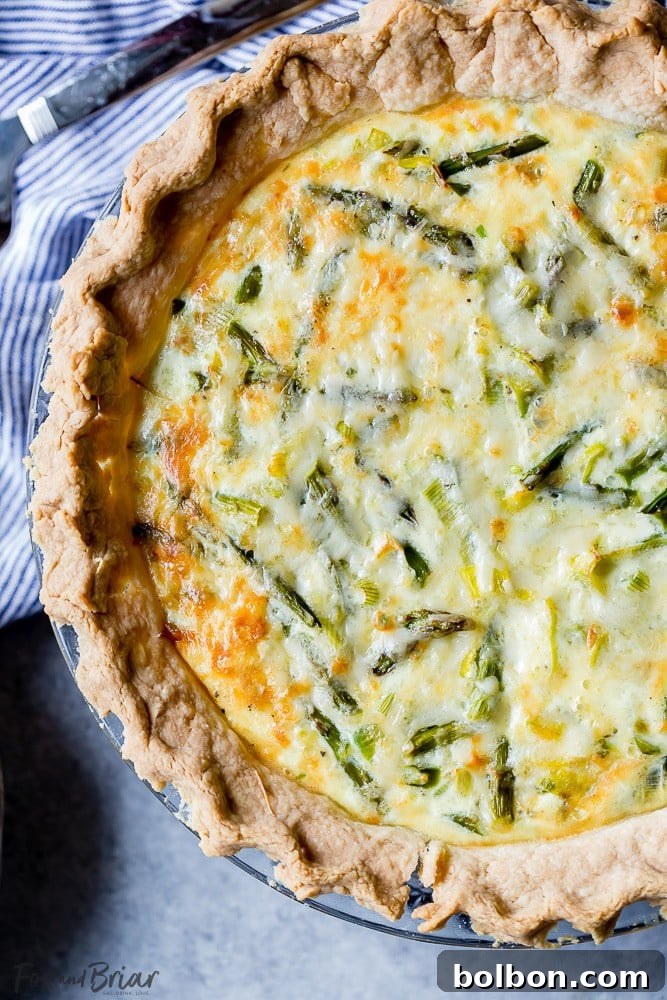 Savory Crab, Asparagus, and Leek Quiche 3 Freshly baked Crab, Asparagus, and Leek Quiche with a golden crust