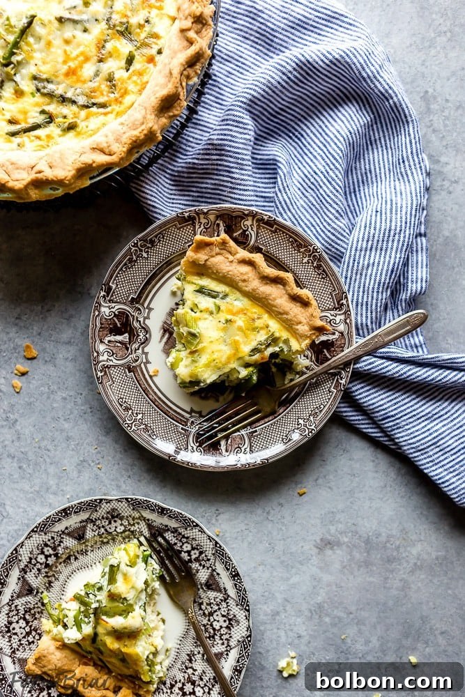 Savory Crab, Asparagus, and Leek Quiche 8 Final slice of Crab, Asparagus, and Leek Quiche ready to be served
