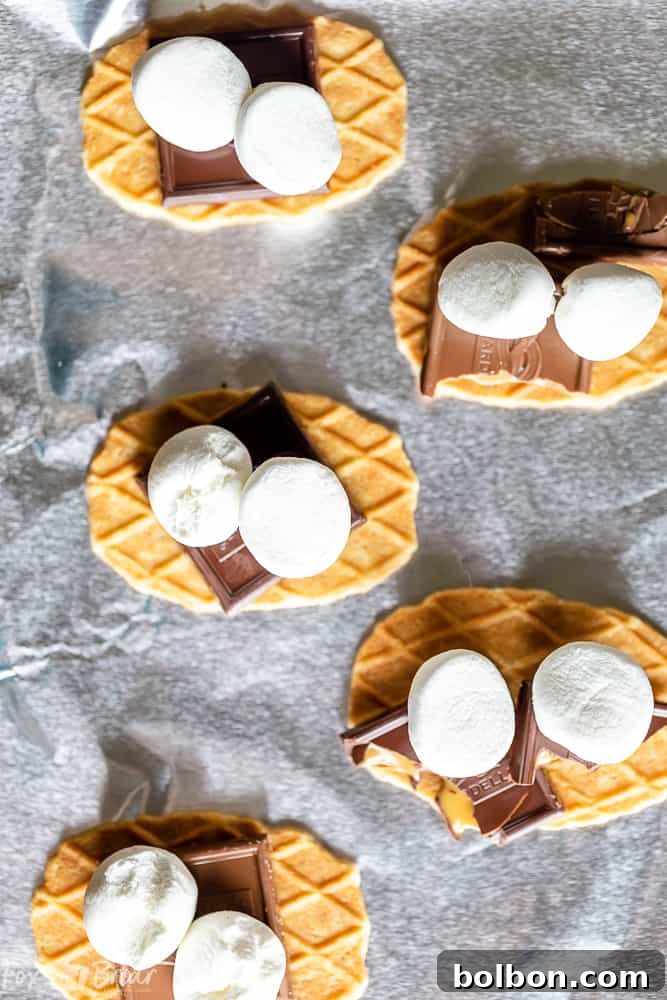 Hands holding a freshly baked Salted Caramel S'more