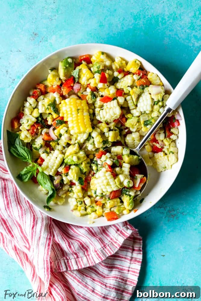 Another perspective of the fresh summer corn salad in a bowl, showcasing its appetizing appeal.