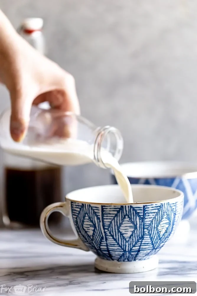 Close-up of a homemade Brown Sugar Cardamom Latte, showcasing its rich color and creamy texture. Discover this easy cardamom coffee recipe for a cozy treat.