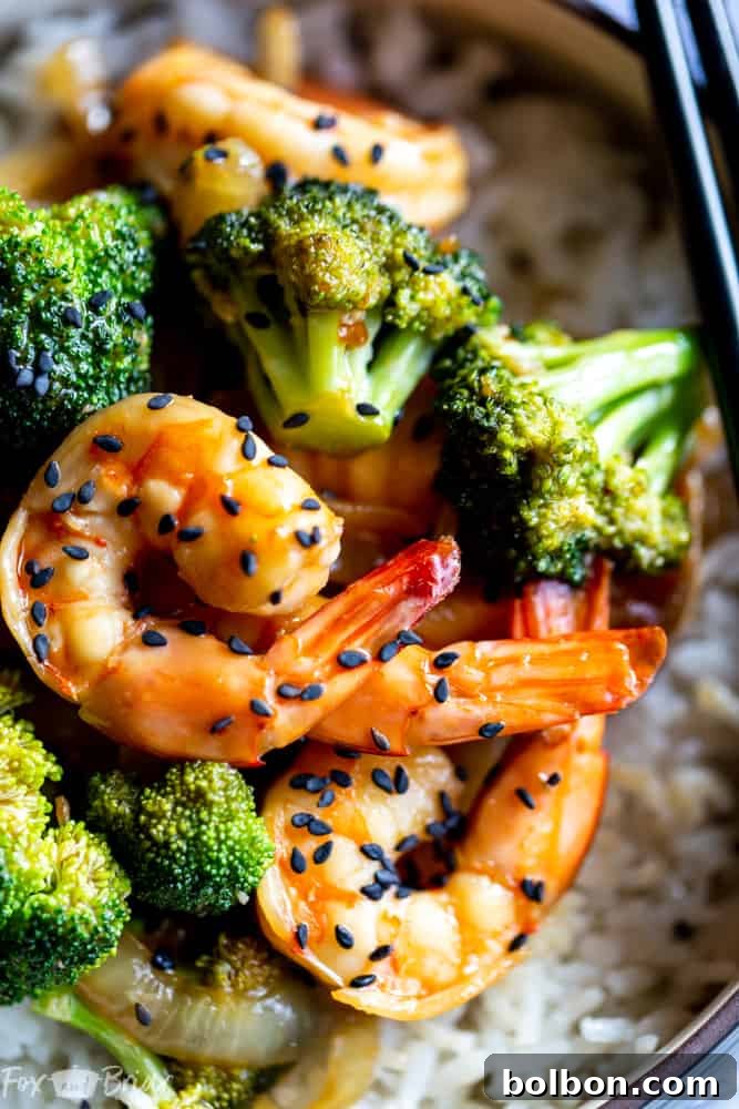 The final cooked Broccoli and Shrimp Stir Fry, presented in a large serving bowl, ready to be enjoyed as a quick and healthy dinner.