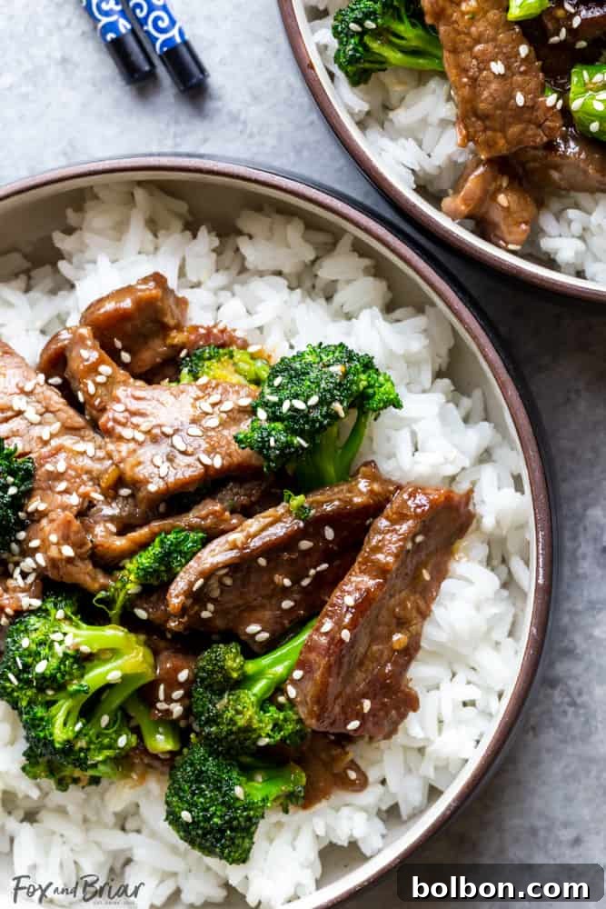 A vibrant plate of homemade Beef and Broccoli stir-fry, showcasing succulent beef slices and bright green broccoli florets, ready in under 30 minutes.