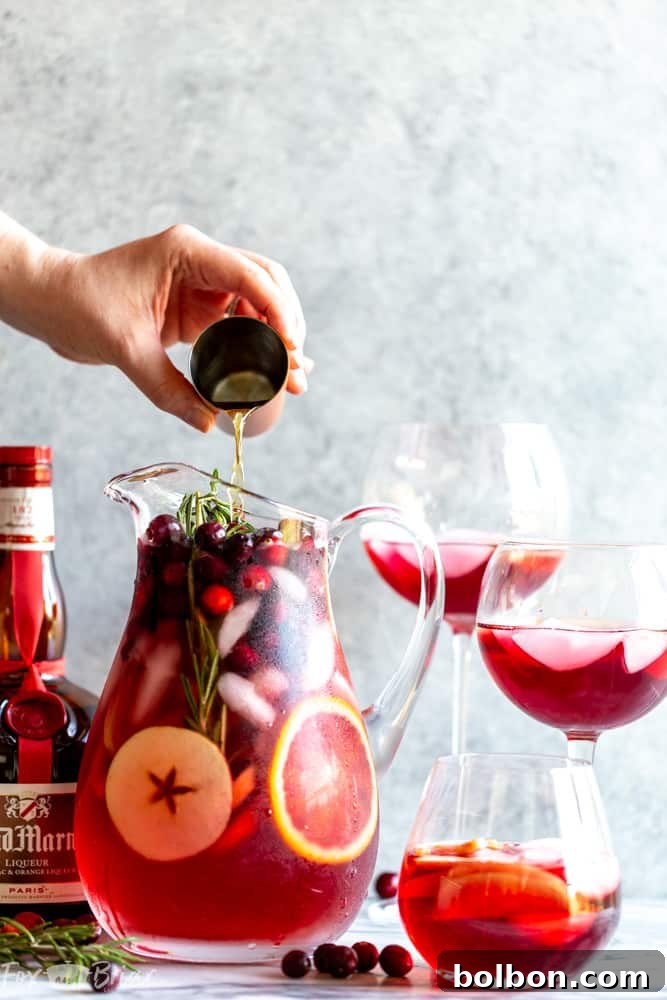 Ingredients for Cranberry Orange Sangria laid out on a table
