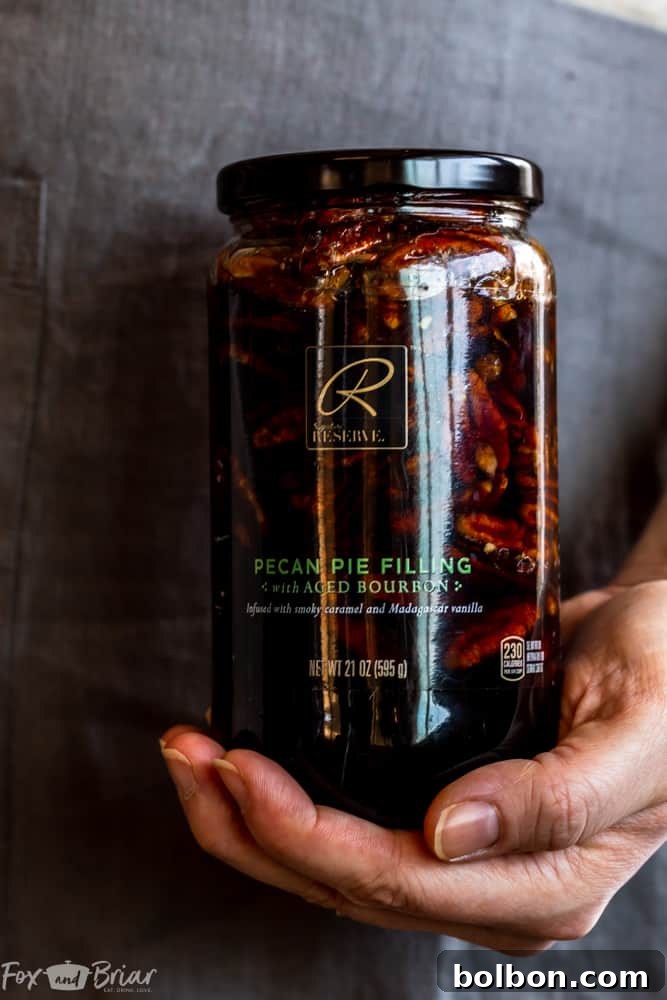 Person holding a gift box from the Signature RESERVE collection