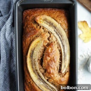Spiced Banana Bread loaf with a decorative banana slice on top