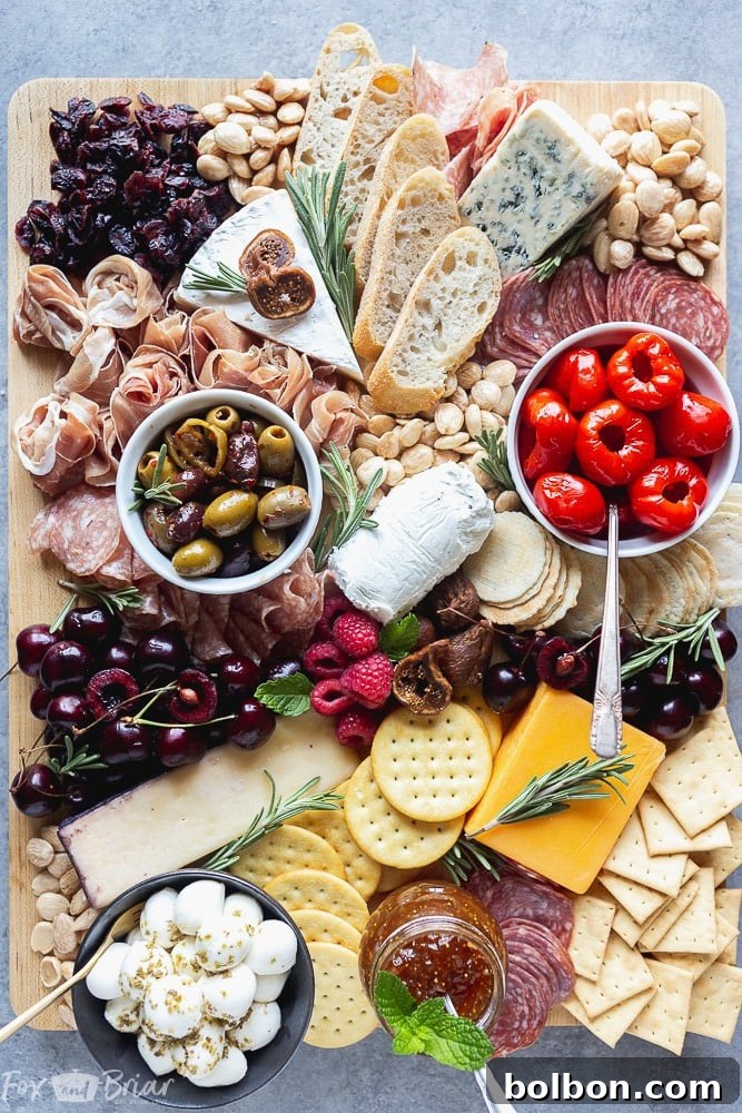 Beautifully arranged Charcuterie Board with cheeses, meats, fruits, and crackers