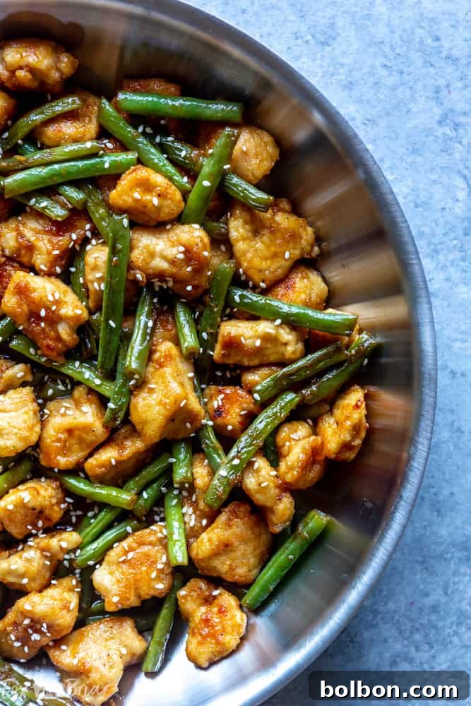 Quick Zesty Lemon Chicken Stir Fry 2 Honey Lemon Chicken Stir Fry with green beans, a healthy and easy 30-minute chicken breast recipe that tastes like Chinese takeout at home.
