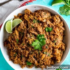 Crispy Slow Cooker Pork Carnitas 6 Close-up of Slow Cooker Mexican Pulled Pork Carnitas, perfect for a recipe card image.