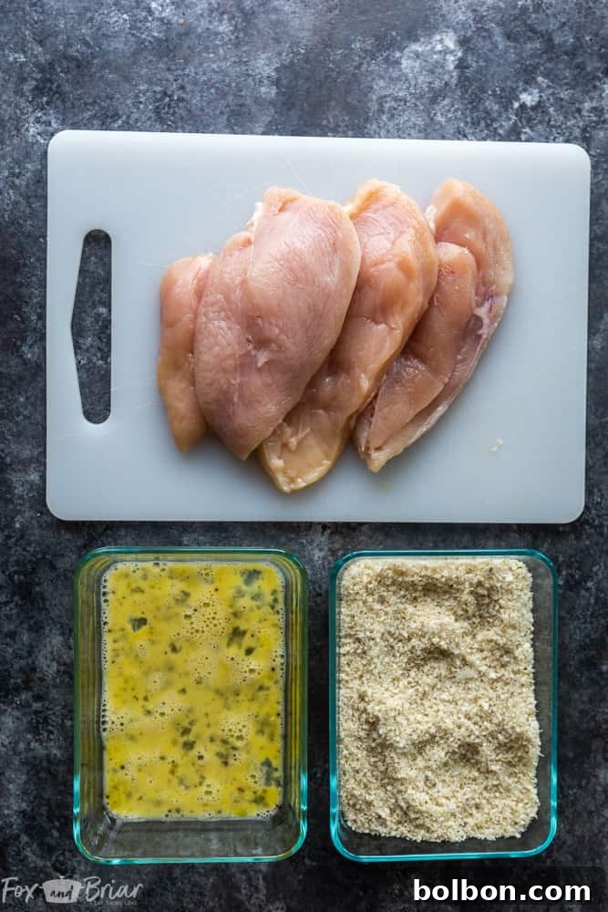Step-by-step guide to preparing chicken breasts for Oven Baked Chicken Parmesan. Learn how to butterfly and pound chicken for even cooking and enhanced flavor. Ideal for quick dinner recipes and healthy chicken breast dishes.