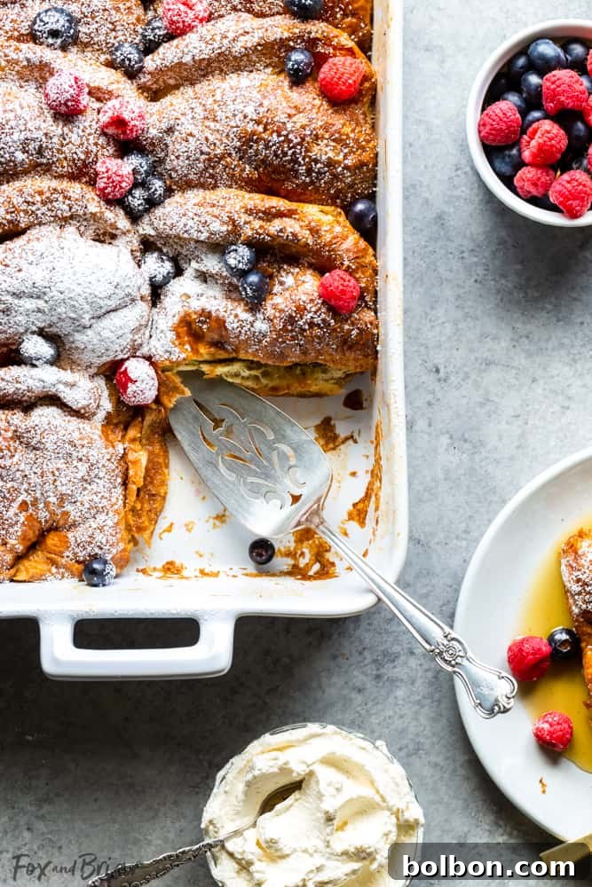 Overnight Croissant French Toast Strata 8 French Toast casserole in pan, golden brown and ready to serve
