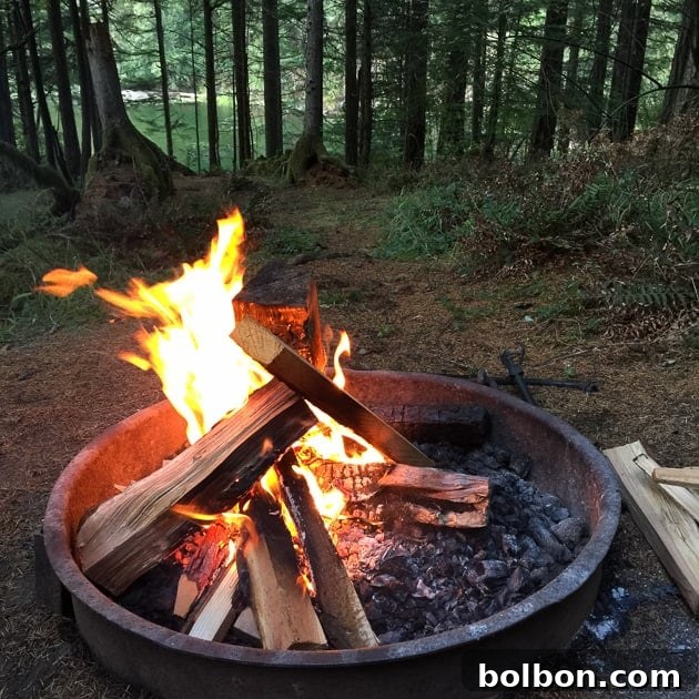 Outdoor glamping setup with comfortable chairs and a scenic lake view on Orcas Island
