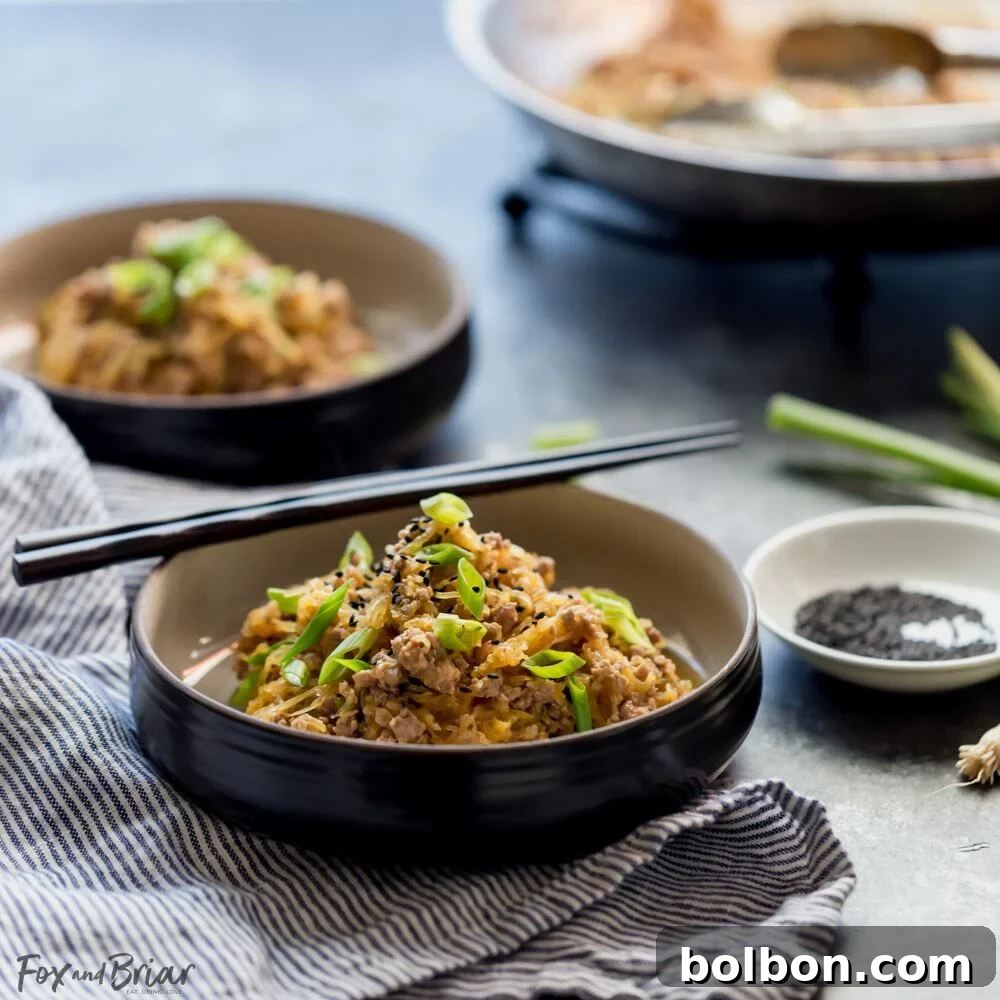 Spaghetti Squash and Pork Stir Fry is a fast and easy low carb dinner with minimal prep. | Quick and Easy Low Carb Dinner Recipe | High Protein Low Carb Dinner Recipes | Low Carb 30 Minute Meals | Low Carb Family Meals | Spaghetti Squash Recipes with Meat | Healthy Spaghetti Squash Recipes | Simple Spaghetti Squash Recipe | How to cook spaghetti Squash